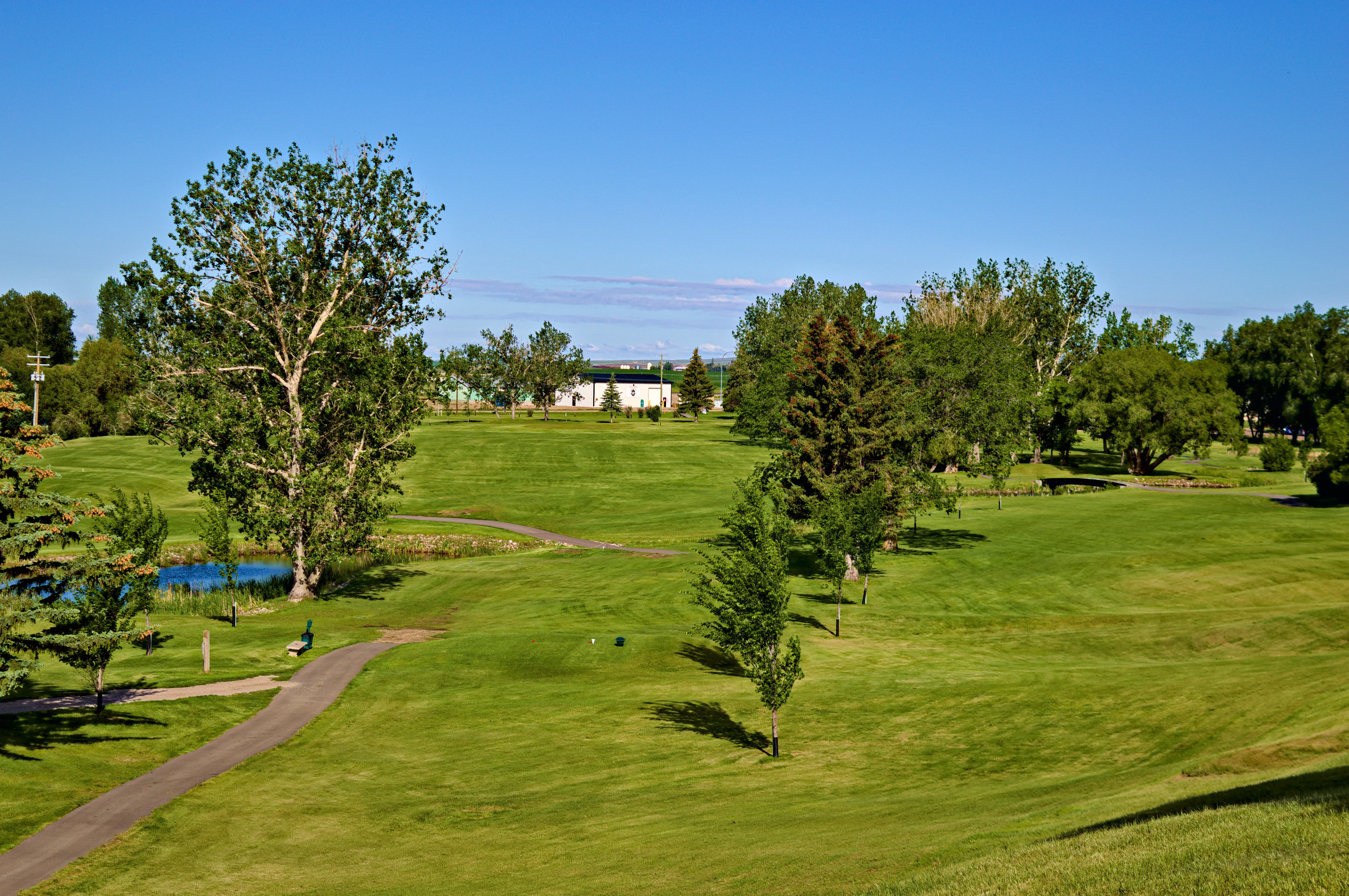 Riverside Golf Course in golden-hour light.